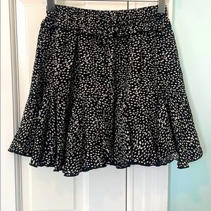 black spotted skirt